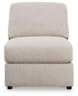 Ashley Furniture Ballyton sectional sofa with plush cushions and modern design, shown in a spacious living room setting.