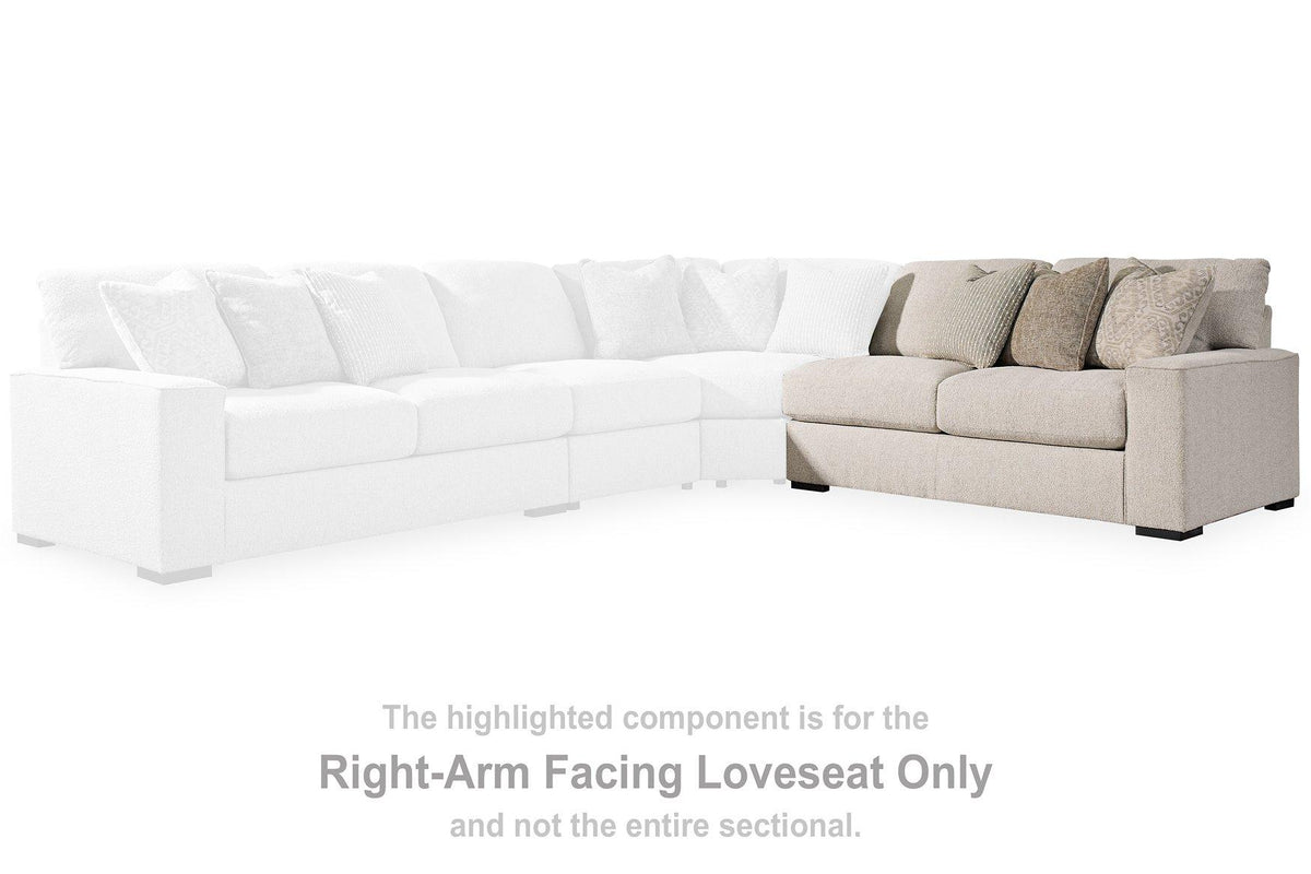 Ashley Furniture Ballyton Sectional sofa with plush cushions and neutral fabric, perfect for modern living rooms.