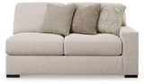Ashley Furniture Ballyton sectional sofa with plush cushions and fabric upholstery, shown in a modern living room setting.