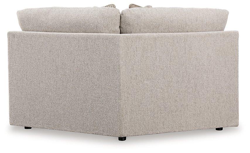 Red Ballyton sectional sofa by Ashley Furniture with plush cushions and modern design, perfect for stylish living room seating.