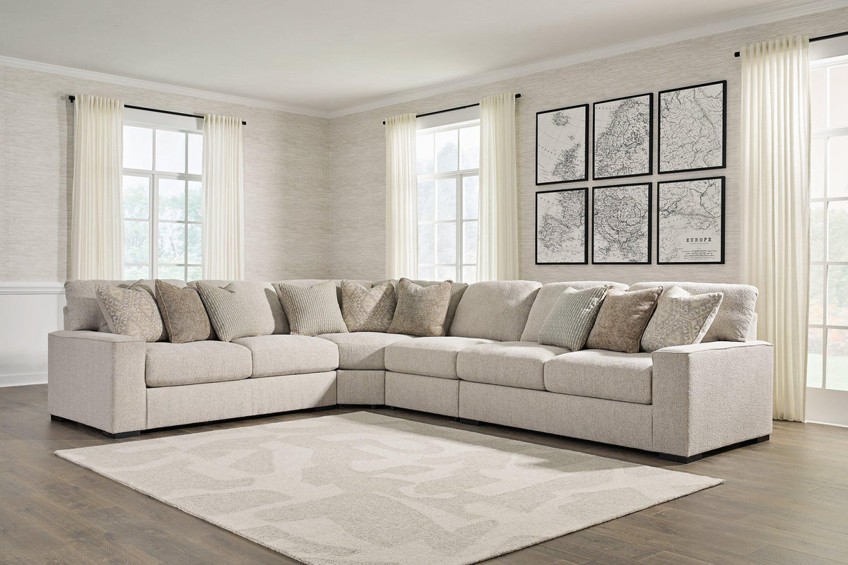 Ashley Furniture Ballyton sectional sofa with plush cushions and modern design, shown in a living room setting.