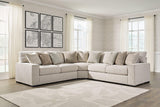 Ashley Furniture Ballyton Sectional with plush fabric upholstery and ample seating, ideal for modern living rooms.