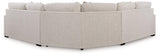 Ashley Furniture Ballyton sectional sofa with plush fabric cushions and modern design, shown in a spacious living room setting.