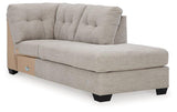 Ashley Mahoney 2-piece sleeper sectional with chaise, featuring plush upholstery and a modern design for comfortable living space.