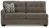 Ashley Mahoney 2-Piece Sleeper Sectional with Chaise, modern fabric sofa with chaise lounge and fold-out bed, in a stylish living room setting.