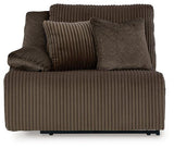 Ashley Furniture Top Tier reclining sectional sofa with chaise, featuring plush cushions and modern design in a spacious living room setting.