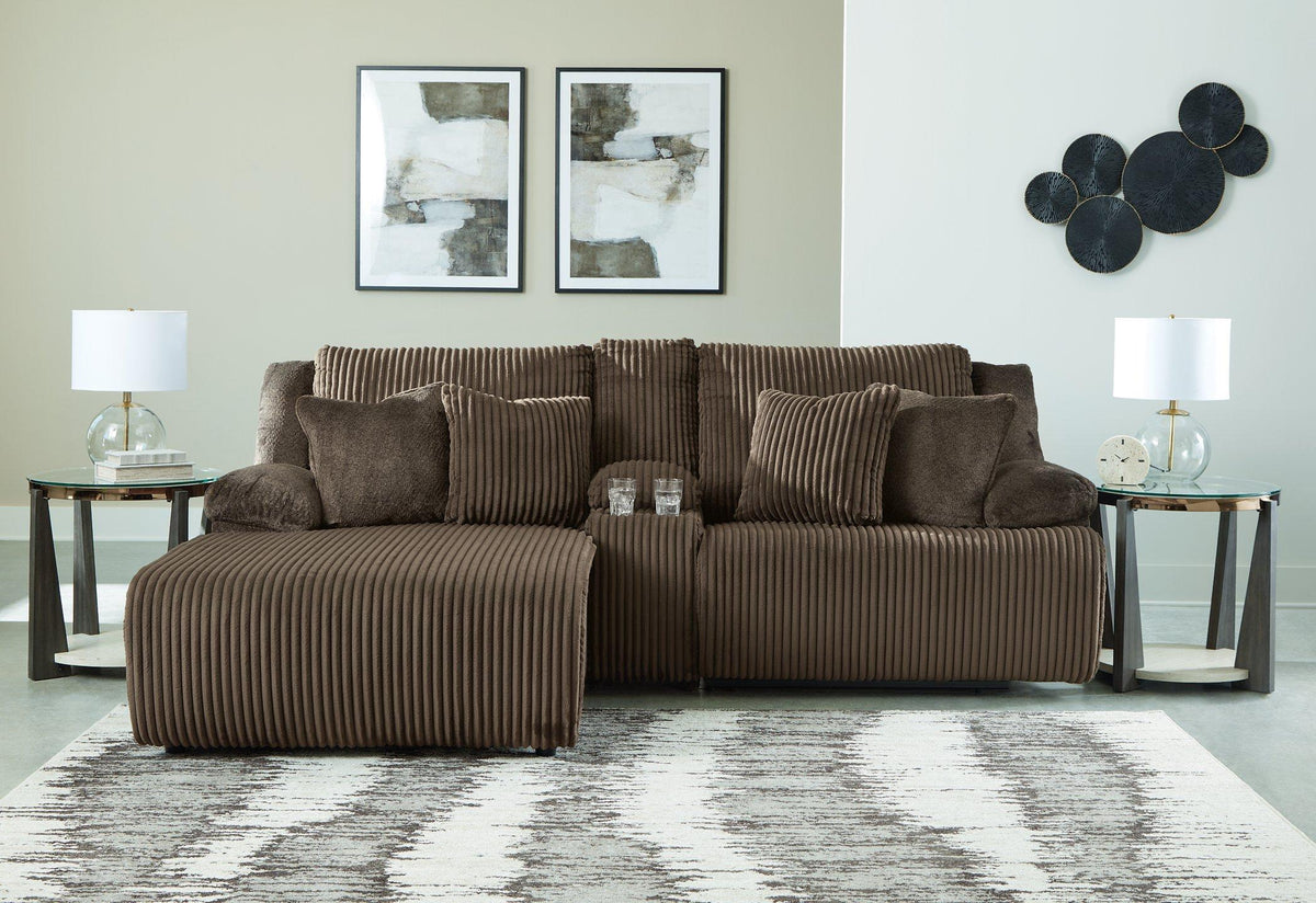 Ashley Furniture Top Tier reclining sectional sofa with chaise, featuring plush cushions and modern design for comfortable lounging.