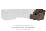 Ashley Furniture Top Tier reclining sectional sofa with chaise, featuring plush cushions and a modern design for comfortable seating.