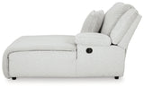Ashley Furniture top tier reclining sectional sofa with chaise, featuring plush cushions and modern design, shown from side view.