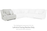 Ashley Furniture Top Tier reclining sectional sofa with chaise, featuring plush cushions and modern design in a spacious living room.