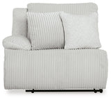 Ashley Furniture Top Tier reclining sectional sofa with chaise, showing plush fabric and reclining features from a head-on view.