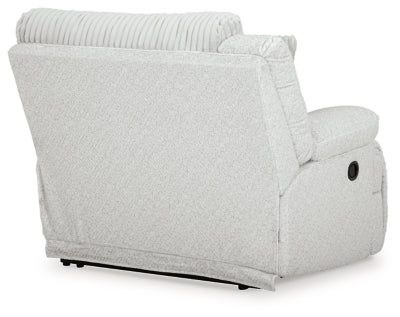 Ashley Furniture Top Tier reclining sectional sofa with chaise, featuring plush cushions and a modern design.