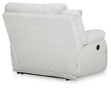 Ashley Furniture Top Tier reclining sectional sofa with chaise, featuring plush cushions and a modern design.