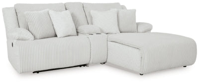 Ashley Furniture Top Tier reclining sectional sofa with chaise, showing plush fabric, reclining seats, and modern design from an angled view.