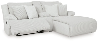 Ashley Furniture Top Tier reclining sectional sofa with chaise, featuring plush cushions and a modern open design.