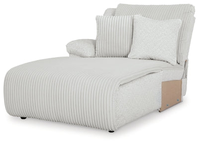 Ashley Furniture Top Tier reclining sectional sofa with chaise, featuring plush cushions and a modern design for comfortable lounging.