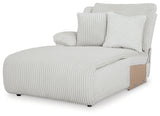 Ashley Furniture Top Tier reclining sectional sofa with chaise, featuring plush cushions and a modern design for comfortable lounging.