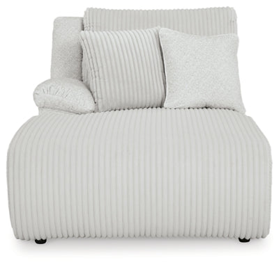 Ashley Furniture Top Tier reclining sectional sofa with chaise, showing plush cushions and dark fabric upholstery.