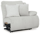 Ashley Furniture Top Tier reclining sectional sofa with chaise, shown from an angled view, featuring plush cushions and a modern design.