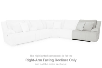 Ashley Furniture Top Tier reclining sectional sofa with chaise, featuring plush cushions and modern design in a spacious living room.