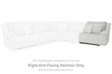 Ashley Furniture Top Tier reclining sectional sofa with chaise, featuring plush cushions and modern design in a spacious living room.