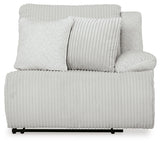 Ashley Furniture Top Tier reclining sectional sofa with chaise, showing plush cushions and reclining features in a modern living room setting.