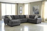 Ashley Furniture Ambee 3-piece sectional with chaise, showing plush fabric cushions and modern design in a spacious living room setting.