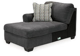Ashley Furniture Ambee 3-piece sectional with chaise showing plush cushions and modern design in a living room setting.