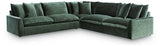 Ashley Furniture Carriage View Sectional sofa with plush cushions and neutral fabric in a modern living room setting.