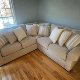 Ashley Furniture Lennox 3-piece corner sectional sofa with plush cushions and modern design, shown in a living room setting.