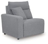 Ashley Furniture ModMax Power Reclining Sectional Sofa with plush cushions and reclining seats, angled view showcasing modern design.