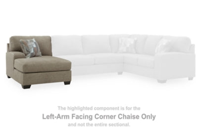 Ashley Furniture Newellen sectional with double chaise, featuring plush cushions and contemporary design in a cozy living room setting.