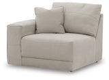 Ashley Furniture Next-Gen Gaucho sectional with plush cushions, modern design, and neutral upholstery shown from an angled view.