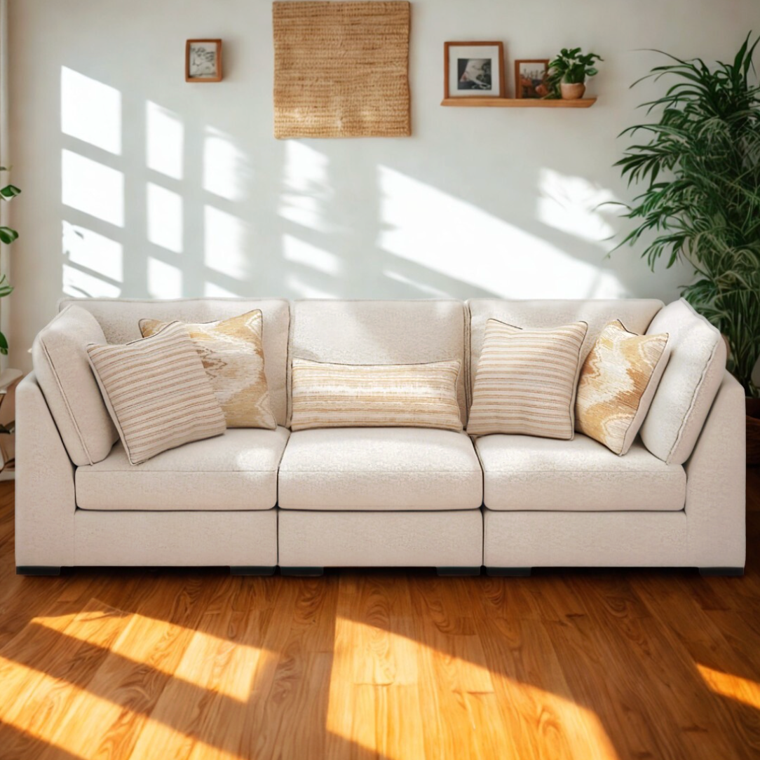 Ashley Furniture Pebblebrook 3-piece sectional sofa with plush cushions and modern design, shown in a cozy living room setting.