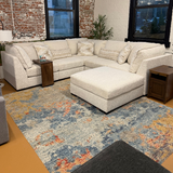 Ashley Furniture Pebblebrook 5-piece corner sectional with ottoman, featuring plush fabric and modern design for comfortable living space.
