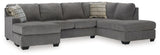 Ashley Furniture Riverfield sectional with chaise, showing a modern fabric sofa with a spacious chaise lounge, angled view.