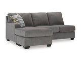 Ashley Furniture Riverfield sectional with chaise, showing a spacious L-shaped sofa with plush cushions and modern design.