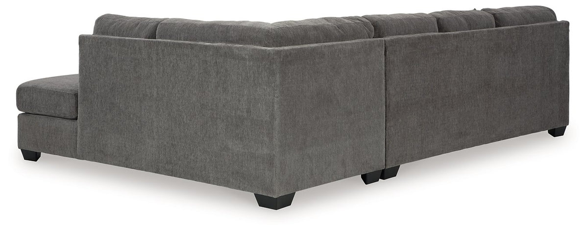 Ashley Furniture Riverfield sectional with chaise, showing the back view of the beige fabric sofa and chaise lounge.