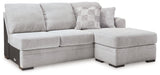 Ashley Furniture Gabyleigh sectional with chaise, showcasing plush fabric and modern design in a spacious living room setting.