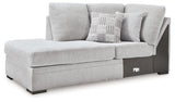 Ashley Furniture Gabyleigh sectional with chaise, featuring plush fabric upholstery and a spacious seating arrangement.