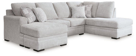 Ashley Furniture Gabyleigh sectional with chaise, featuring plush cushions and modern design in a cozy living room setting.