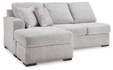 Ashley Furniture Gabyleigh sectional with chaise showing plush fabric upholstery and spacious seating arrangement.