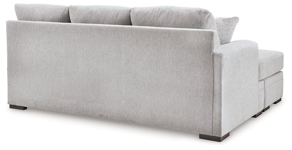 Ashley Furniture Gabyleigh sectional with chaise showing plush fabric, modern design, and spacious seating in a stylish living room setting.
