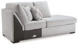 Ashley Furniture Gabyleigh sectional with chaise, showcasing a modern fabric sofa with a spacious chaise lounge and plush cushions.