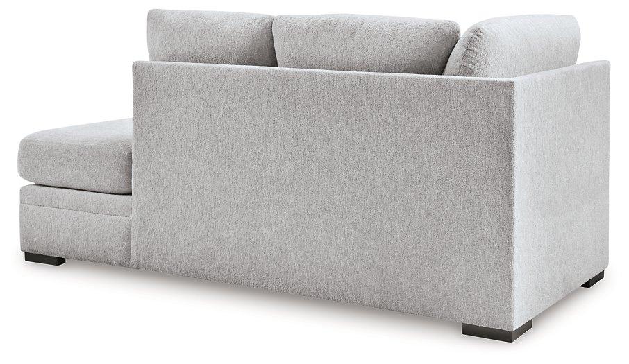 Ashley Furniture Gabyleigh sectional with chaise, showing plush fabric upholstery and contemporary design in a spacious living room setting.