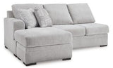 Ashley Furniture Gabyleigh sectional with chaise, featuring plush upholstery and modern design, shown in a stylish living room setting.