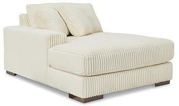 Ashley Furniture Lindyn sectional with chaise, featuring plush upholstery and modern design, shown in a contemporary living room setting.