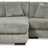 Ashley Furniture Lindyn sectional with chaise, featuring plush fabric upholstery and modern design for comfortable living space.
