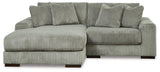 Ashley Furniture Lindyn sectional with chaise, featuring plush fabric upholstery and modern design for comfortable living space.