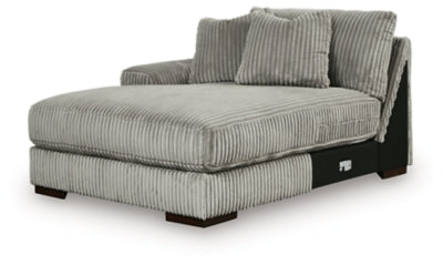 Ashley Furniture Lindyn sectional with chaise, showing a modern fabric sofa with plush cushions and a sleek design.